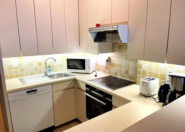 Апартаменты Beachfront In *